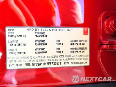 Zdjęcie 12 z 12 samochodu: 2014 TESLA MODEL S VIN:5YJSA1H17EFP30571 - miniatura