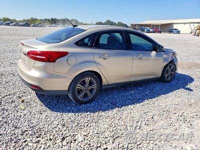 Trzecie zdjęcie samochodu z tyłu: 2017 FORD FOCUS SE VIN:1FADP3FEXHL266076 - miniatura