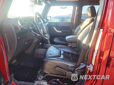 Zdjęcie 7 z 13 samochodu: 2013 JEEP WRANGLER UNLIMITED SAHARA VIN:1C4BJWEG2DL571458 - miniatura