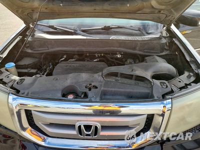 Zdjęcie 12 z 13 samochodu: 2011 HONDA PILOT TOURING VIN:5FNYF3H93BB047405 - miniatura