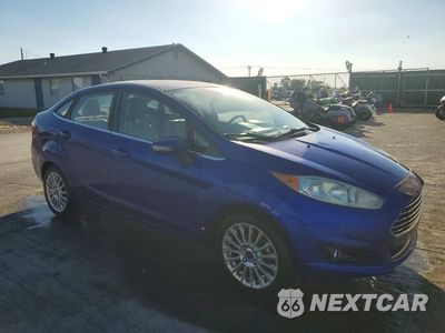 Czwarte zdjęcie samochodu z boku: 2015 FORD FIESTA TITANIUM VIN:3FADP4CJ0FM189723 - miniatura