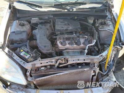 Zdjęcie 11 z 13 samochodu: 2002 HONDA CIVIC LX VIN:1HGEM22502L077324 - miniatura