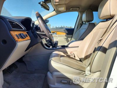 Zdjęcie 7 z 12 samochodu: 2013 LINCOLN MKX VIN:2LMDJ6JK2DBL17705 - miniatura