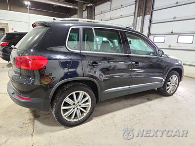 Trzecie zdjęcie samochodu z tyłu: 2014 VOLKSWAGEN TIGUAN S VIN:WVGBV3AX0EW606566 - miniatura