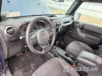 Zdjęcie 8 z 12 samochodu: 2013 JEEP WRANGLER SPORT VIN:1C4AJWAG0DL514421 - miniatura