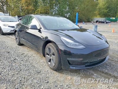 Czwarte zdjęcie samochodu z boku: 2023 TESLA MODEL 3 VIN:5YJ3E1EA8PF586528 - miniatura