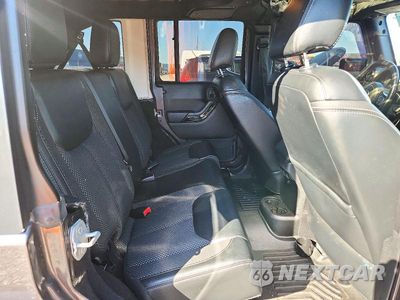 Zdjęcie 10 z 12 samochodu: 2016 JEEP WRANGLER UNLIMITED SAHARA VIN:1C4BJWEG3GL153074 - miniatura