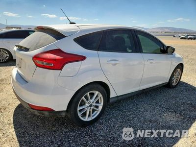 Trzecie zdjęcie samochodu z tyłu: 2015 FORD FOCUS SE VIN:1FADP3K21FL329316 - miniatura
