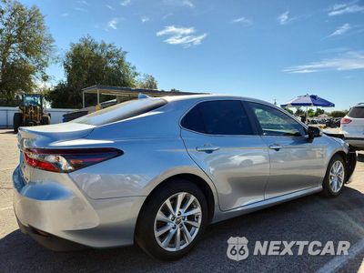 Trzecie zdjęcie samochodu z tyłu: 2023 TOYOTA CAMRY LE VIN:4T1C11AK7PU804102 - miniatura