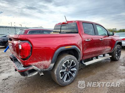 Trzecie zdjęcie samochodu z tyłu: 2026 GMC CANYON DENALI VIN:1GTP2FEK6T1239329 - miniatura