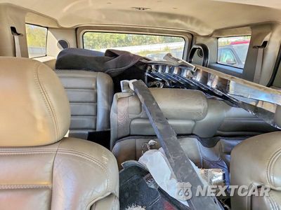 Zdjęcie 10 z 14 samochodu: 2004 HUMMER H2 VIN:5GRGN23U04H114421 - miniatura