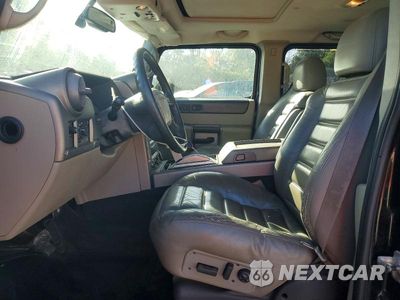 Zdjęcie 7 z 13 samochodu: 2003 HUMMER H2 VIN:5GRGN23U23H109588 - miniatura