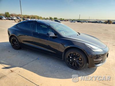Czwarte zdjęcie samochodu z boku: 2022 TESLA MODEL 3 VIN:5YJ3E1EB8NF191030 - miniatura
