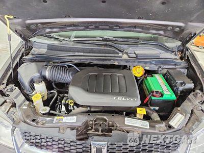 Zdjęcie 12 z 13 samochodu: 2015 DODGE GRAND CARAVAN SXT VIN:2C4RDGCG3FR584695 - miniatura