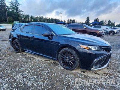 Czwarte zdjęcie samochodu z boku: 2022 TOYOTA CAMRY XSE VIN:4T1K61AK2NU026379 - miniatura