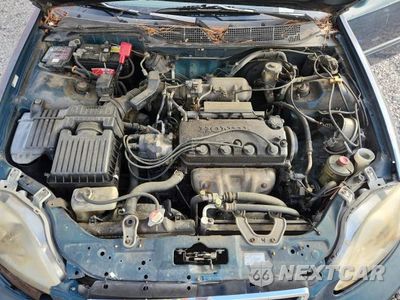 Zdjęcie 11 z 12 samochodu: 1998 HONDA CIVIC EX VIN:JHMEJ8646WS001600 - miniatura