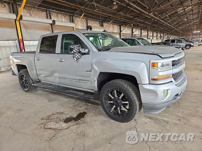 Czwarte zdjęcie samochodu z boku: 2016 CHEVROLET SILVERADO K1500 LT VIN:3GCUKREC0GG136542 - miniatura