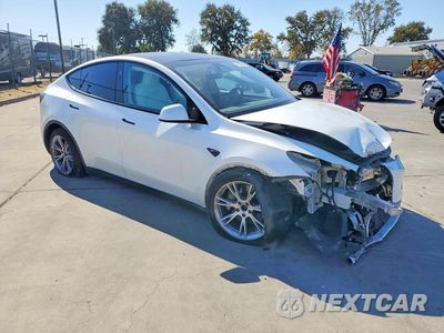 Czwarte zdjęcie samochodu z boku: 2024 TESLA MODEL Y VIN:7SAYGDEE2RF062091 - miniatura