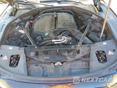 Zdjęcie 11 z 12 samochodu: 2013 BMW 740 I VIN:WBAYA6C54DD143474 - miniatura