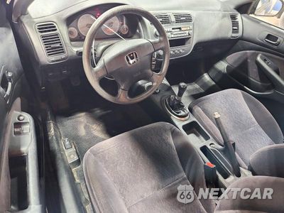 Zdjęcie 8 z 12 samochodu: 2001 HONDA CIVIC LX VIN:1HGEM21541L105321 - miniatura