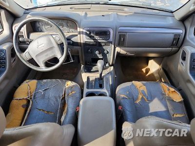 Zdjęcie 8 z 13 samochodu: 2004 JEEP GRAND CHEROKEE LAREDO VIN:1J4GX48S94C302795 - miniatura
