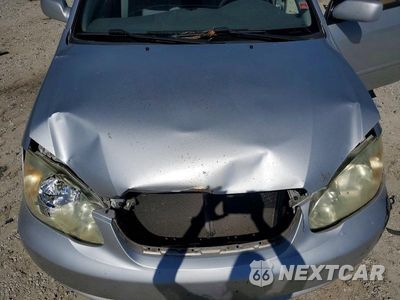 Zdjęcie 11 z 12 samochodu: 2005 TOYOTA COROLLA LE VIN:1NXBR32E25Z499808 - miniatura