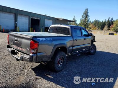 Trzecie zdjęcie samochodu z tyłu: 2018 TOYOTA TACOMA TRD OFF-ROAD VIN:3TMDZ5BN1JM044049 - miniatura