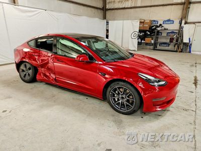 Czwarte zdjęcie samochodu z boku: 2022 TESLA MODEL 3 VIN:5YJ3E1EA1NF370355 - miniatura