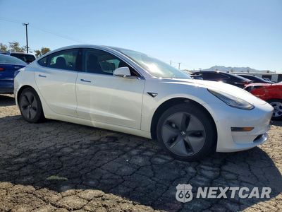 Czwarte zdjęcie samochodu z boku: 2020 TESLA MODEL 3 VIN:5YJ3E1EB6LF650035 - miniatura