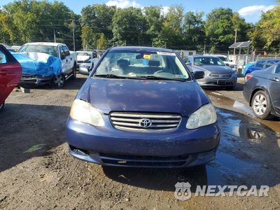 Piąte zdjęcie samochodu w środku: 2004 TOYOTA COROLLA CE VIN:JTDBR32E042042753 - miniatura