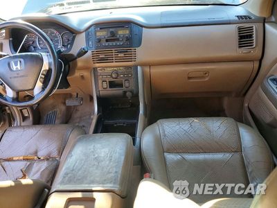 Zdjęcie 8 z 13 samochodu: 2004 HONDA PILOT EXL VIN:2HKYF18534H531953 - miniatura