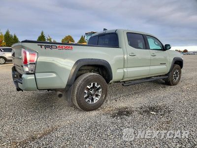Trzecie zdjęcie samochodu z tyłu: 2022 TOYOTA TACOMA TRD OFF-ROAD VIN:3TMDZ5BN2NM129410 - miniatura
