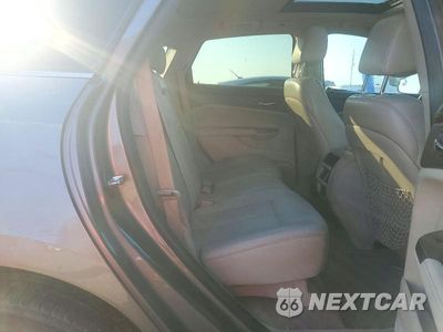 Zdjęcie 10 z 12 samochodu: 2012 CADILLAC SRX VIN:3GYFNBE32CS517754 - miniatura