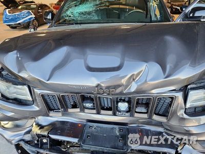 Zdjęcie 12 z 13 samochodu: 2014 JEEP GRAND CHEROKEE SUMMIT VIN:1C4RJFJG7EC329674 - miniatura