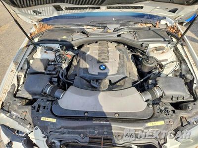 Zdjęcie 11 z 12 samochodu: 2007 BMW 750 LXI VIN:WBAHN83507DT77034 - miniatura