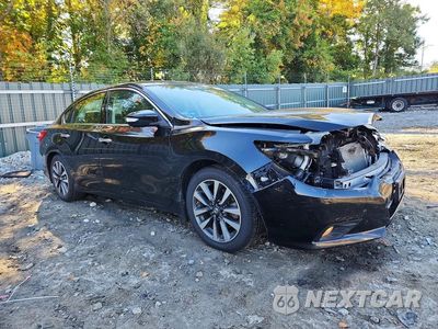 Czwarte zdjęcie samochodu z boku: 2017 NISSAN ALTIMA 2.5 SL VIN:1N4AL3AP0HC471770 - miniatura