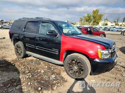 Czwarte zdjęcie samochodu z boku: 2011 CHEVROLET TAHOE K1500 LS VIN:1GNSKAE08BR232207 - miniatura