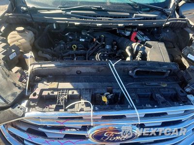Zdjęcie 12 z 14 samochodu: 2021 FORD EDGE TITANIUM VIN:2FMPK4K94MBA21154 - miniatura