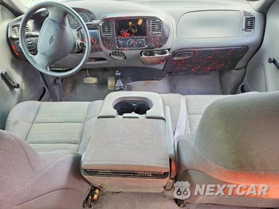 Zdjęcie 8 z 13 samochodu: 2002 FORD F150 VIN:2FTRX08W92CA47826 - miniatura