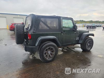 Trzecie zdjęcie samochodu z tyłu: 2010 JEEP WRANGLER SPORT VIN:1J4AA2D11AL124482 - miniatura