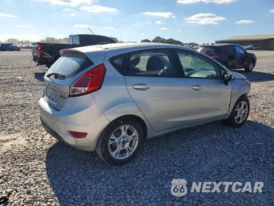 Trzecie zdjęcie samochodu z tyłu: 2015 FORD FIESTA SE VIN:3FADP4EJ0FM118566 - miniatura
