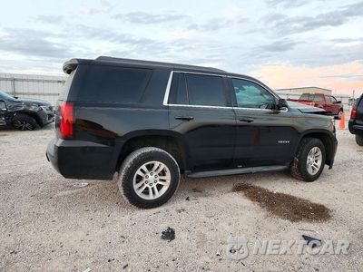Trzecie zdjęcie samochodu z tyłu: 2019 CHEVROLET TAHOE C1500 LS VIN:1GNSCAKC7KR142316 - miniatura