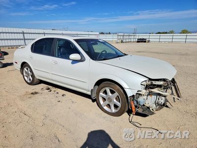 Czwarte zdjęcie samochodu z boku: 2000 NISSAN MAXIMA GXE VIN:JN1CA31A4YT023071 - miniatura