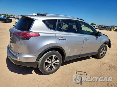 Trzecie zdjęcie samochodu z tyłu: 2018 TOYOTA RAV4 XLE VIN:JTMWFREV4JJ203406 - miniatura