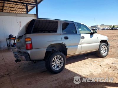 Trzecie zdjęcie samochodu z tyłu: 2003 CHEVROLET TAHOE K1500 VIN:1GNEK13T33R162465 - miniatura