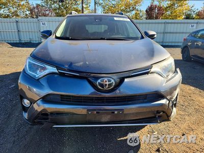 Piąte zdjęcie samochodu w środku: 2017 TOYOTA RAV4 XLE VIN:JTMRFREV7HD215958 - miniatura