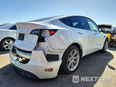 Trzecie zdjęcie samochodu z tyłu: 2023 TESLA MODEL Y VIN:7SAYGDEE9PF922825 - miniatura