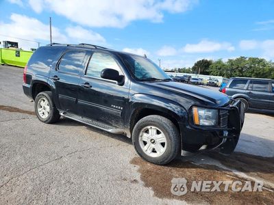 Czwarte zdjęcie samochodu z boku: 2012 CHEVROLET TAHOE K1500 LT VIN:1GNSKBE05CR218658 - miniatura