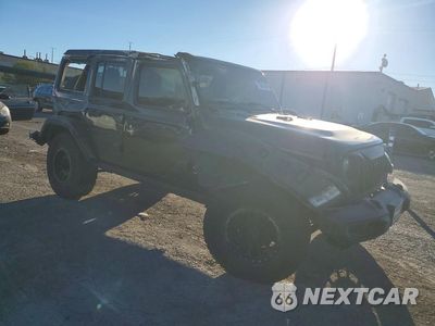 Czwarte zdjęcie samochodu z boku: 2019 JEEP WRANGLER UNLIMITED SAHARA VIN:1C4HJXEN1KW501945 - miniatura