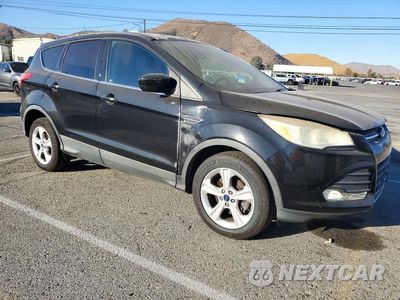 Czwarte zdjęcie samochodu z boku: 2014 FORD ESCAPE SE VIN:1FMCU0GX0EUC08282 - miniatura